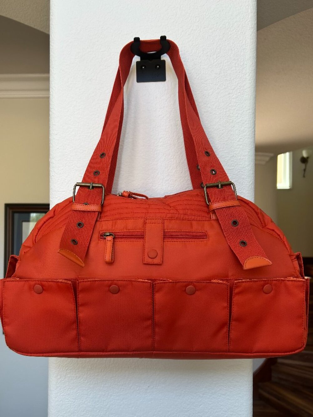 Ven orange multi-pocketed duffel bag